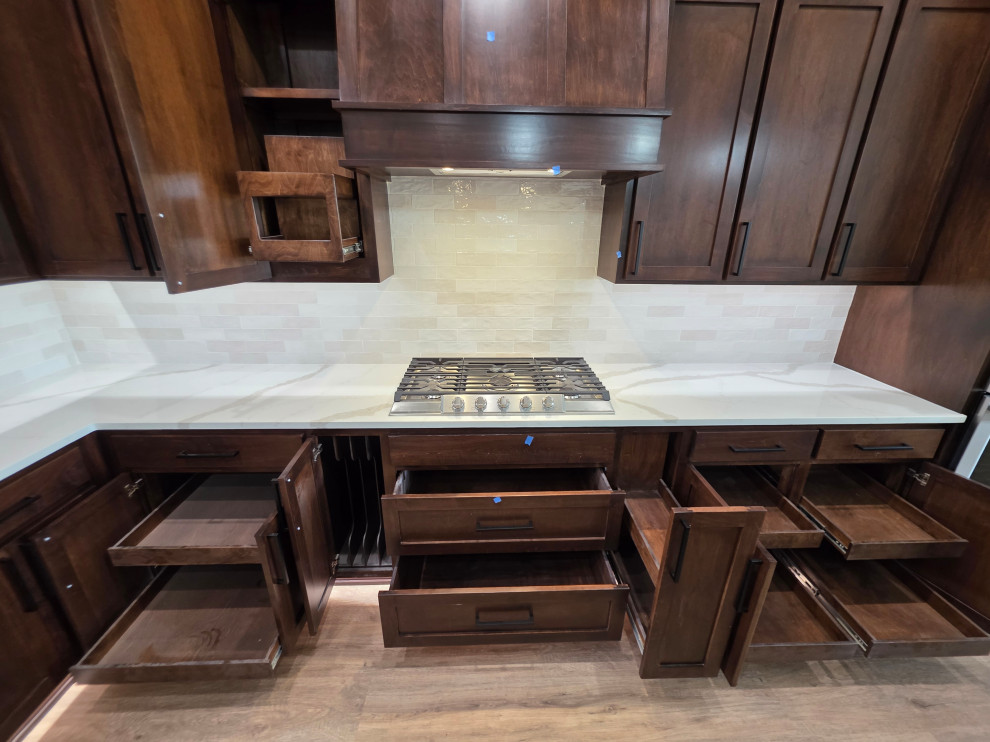 Custom built cabinets with sliding shelves & more