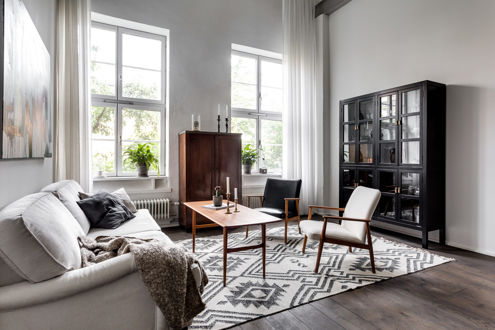 This is an example of a large scandinavian formal open concept living room in Stockholm.