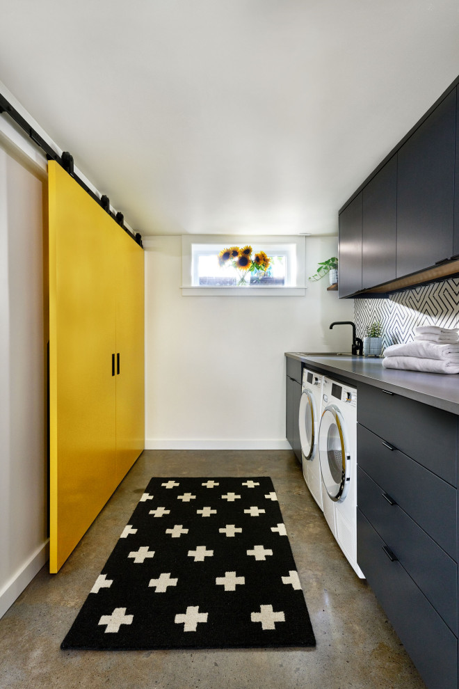 Design ideas for a contemporary laundry room in Portland.