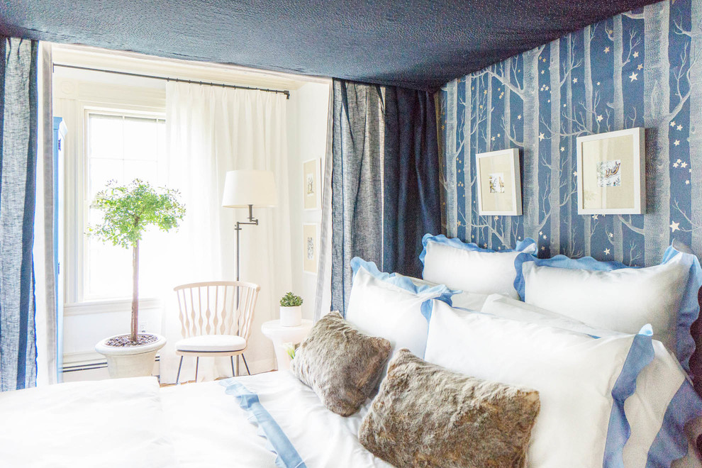 Inspiration for a transitional bedroom remodel in Boston with blue walls