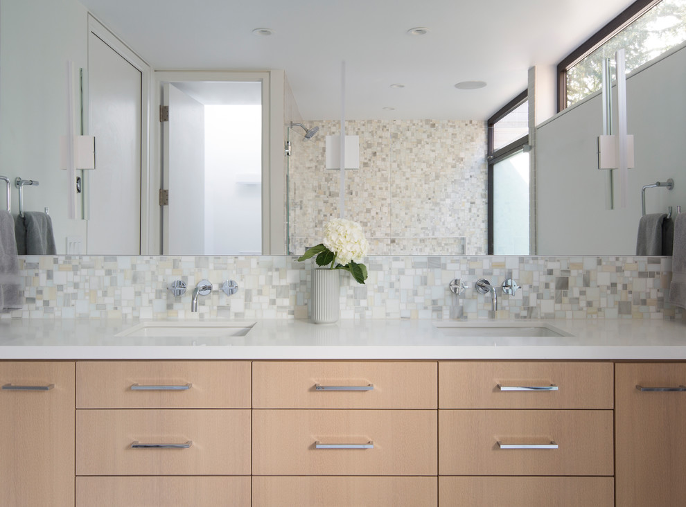 Contemporary bathroom in San Francisco with flat-panel cabinets, light wood cabinets, ceramic tile, an undermount sink, engineered quartz benchtops and white benchtops.