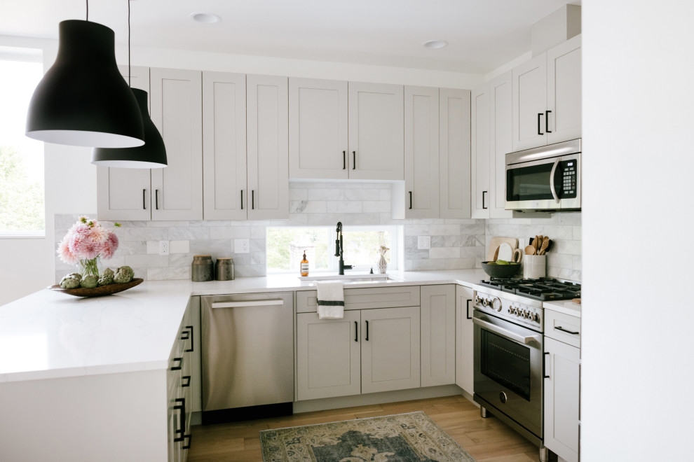 Example of a transitional kitchen design in Seattle