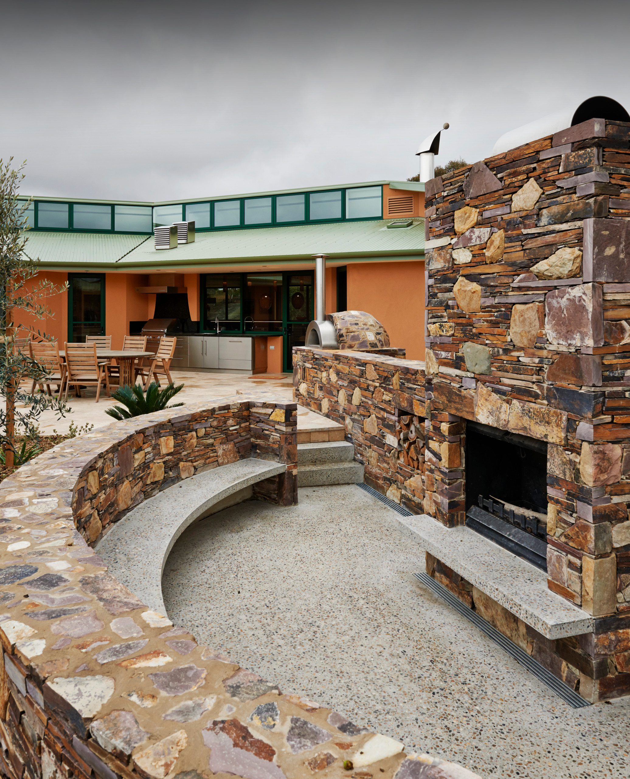 Sunken outdoor fireplace.