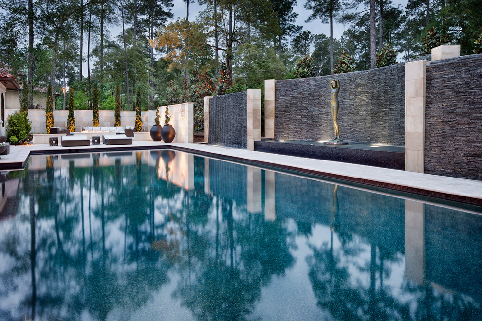 Huge transitional backyard custom-shaped pool fountain photo in Houston