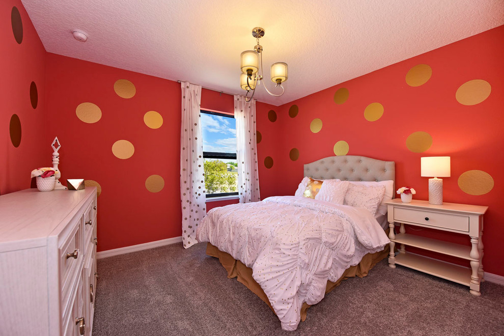 This is an example of a mid-sized transitional kids' room for girls in Orlando with multi-coloured walls and carpet.