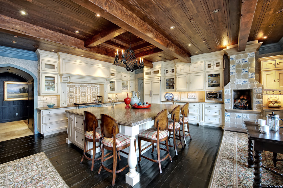 This is an example of a traditional kitchen in Denver with recessed-panel cabinets.