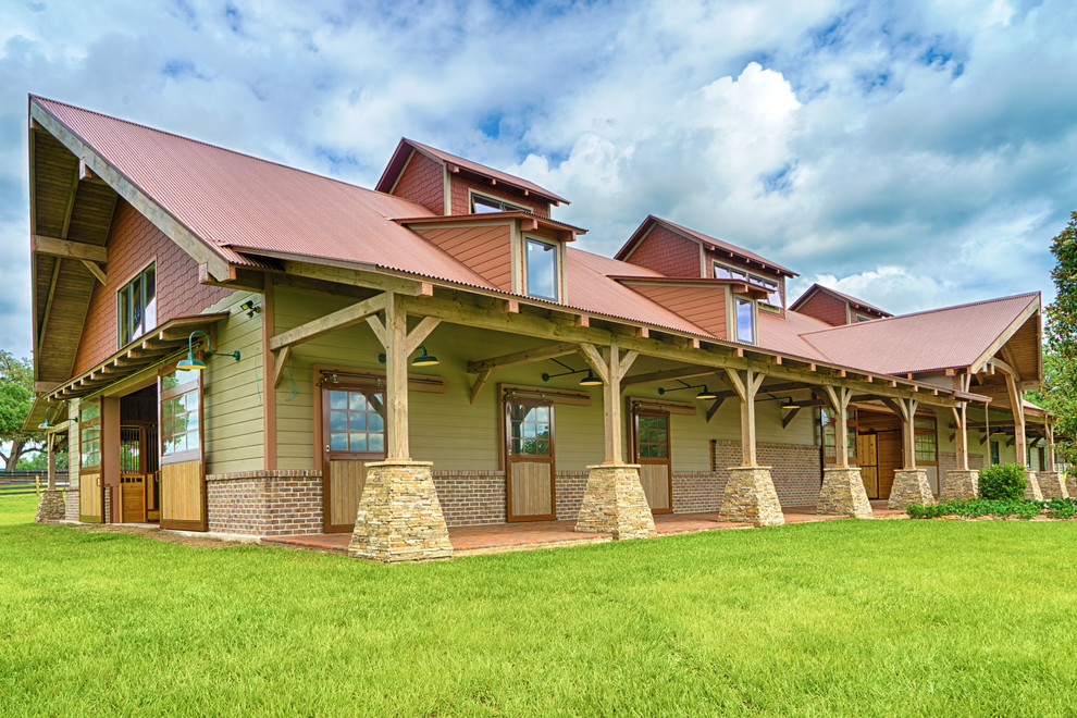 Inspiration for a large rustic two-story wood beige home design remodel