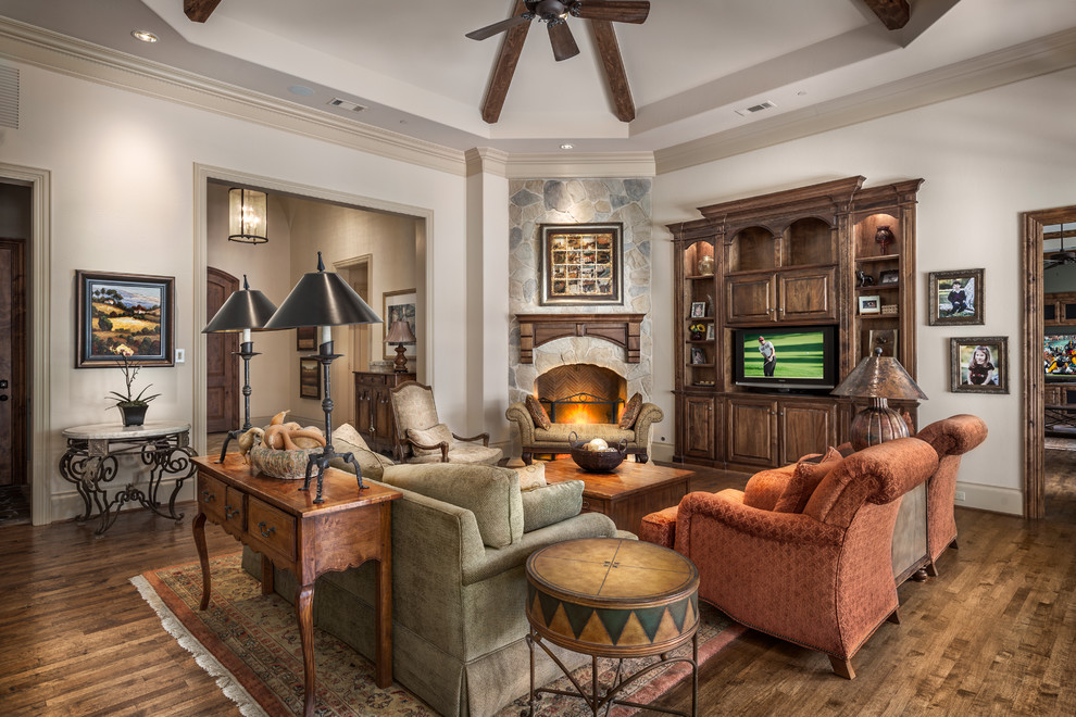 Design ideas for a large traditional open concept living room in Dallas with white walls, dark hardwood floors, a corner fireplace, a stone fireplace surround and a built-in media wall.