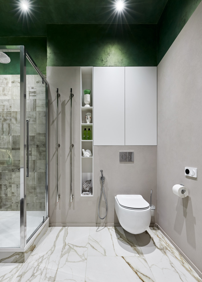 Mid-sized contemporary powder room in Saint Petersburg with flat-panel cabinets, white cabinets, a wall-mount toilet, beige tile, ceramic tile, beige walls, porcelain floors, a vessel sink, solid surface benchtops, beige floor, grey benchtops and a freestanding vanity.