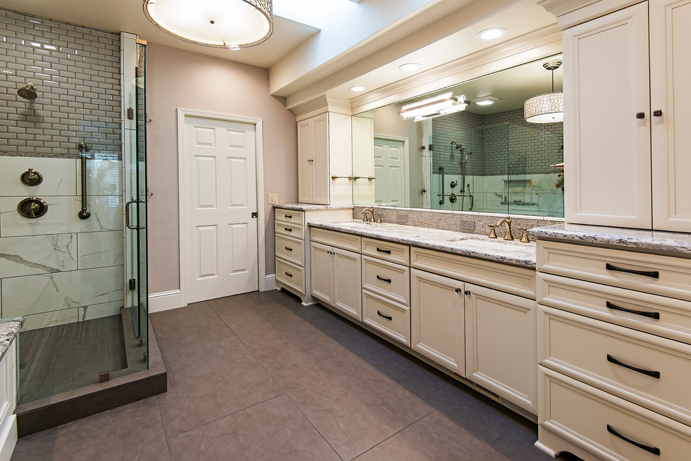 Large traditional master bathroom in Other with recessed-panel cabinets, beige cabinets, an undermount tub, a corner shower, brown tile, gray tile, porcelain tile, brown walls, porcelain floors, an undermount sink, granite benchtops, brown floor and a hinged shower door.