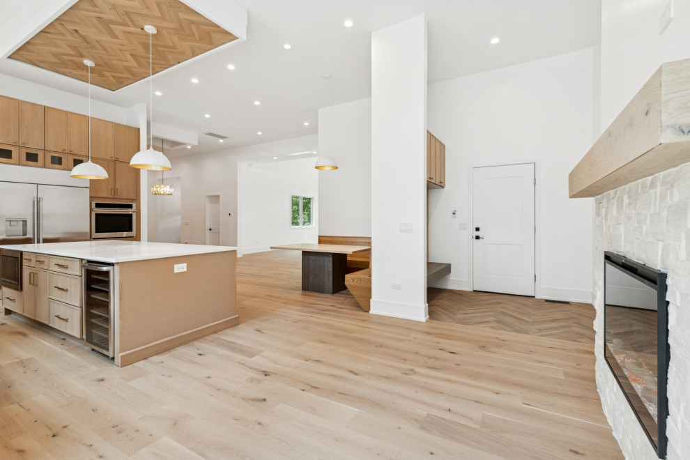 Light-Washed Great Room with Signature Fireplace & Slatted Wood Ceiling