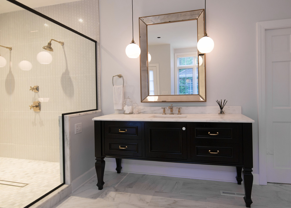 Large transitional master bathroom in New York with furniture-like cabinets, black cabinets, a freestanding tub, a double shower, black and white tile, mosaic tile, grey walls, marble floors, an undermount sink and marble benchtops.