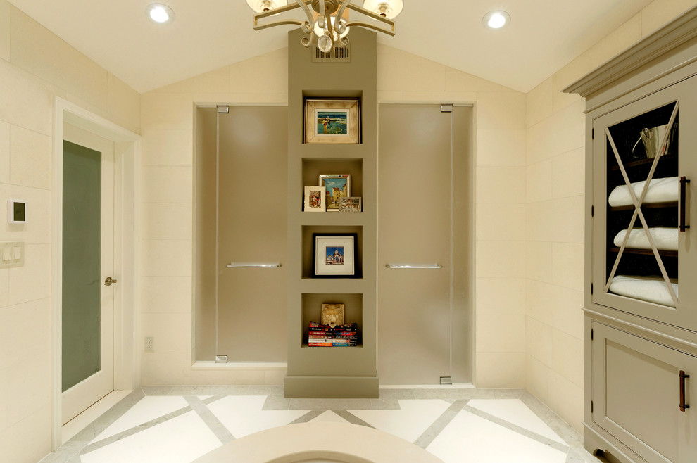 Photo of a large transitional master bathroom in DC Metro with flat-panel cabinets, dark wood cabinets, beige tile, stone tile, beige walls, an undermount sink, an undermount tub, an alcove shower, a one-piece toilet, limestone floors and limestone benchtops.