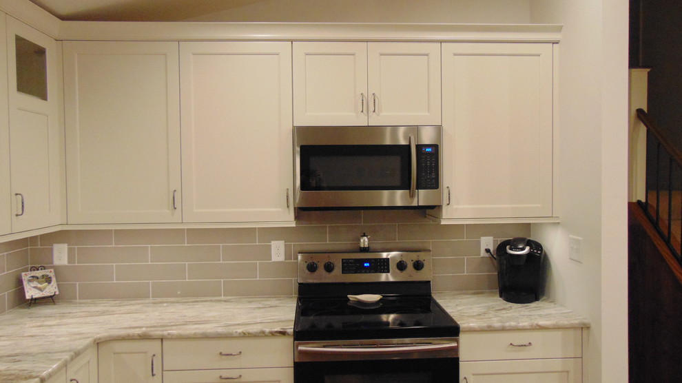 Example of a transitional home design design in Baltimore