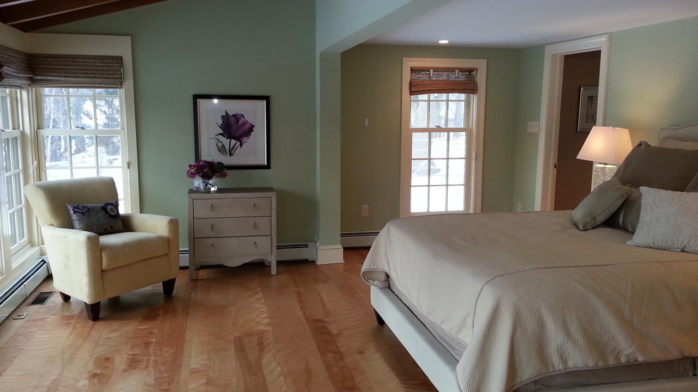 Design ideas for a mid-sized transitional master bedroom in Philadelphia with green walls, light hardwood floors and no fireplace.