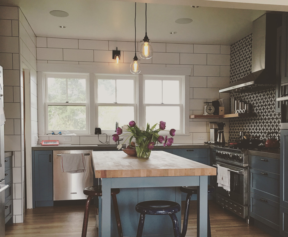 Example of a transitional kitchen design in Seattle