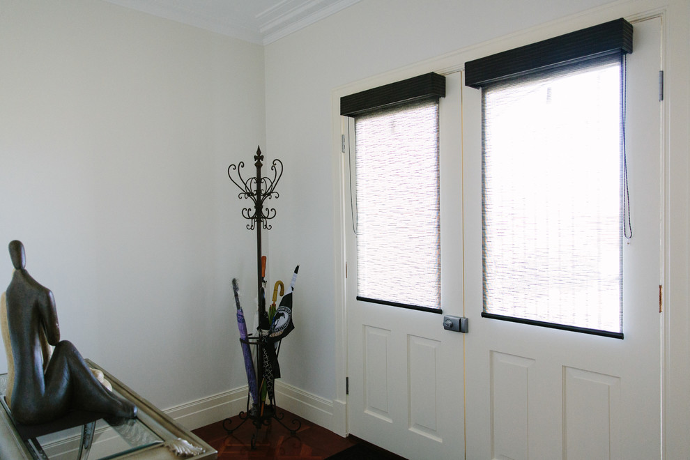 Small contemporary front door in Melbourne with white walls, medium hardwood floors, a double front door and a white front door.