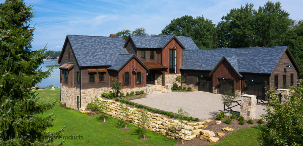 Inspiration for a country house exterior in Boise with wood siding.