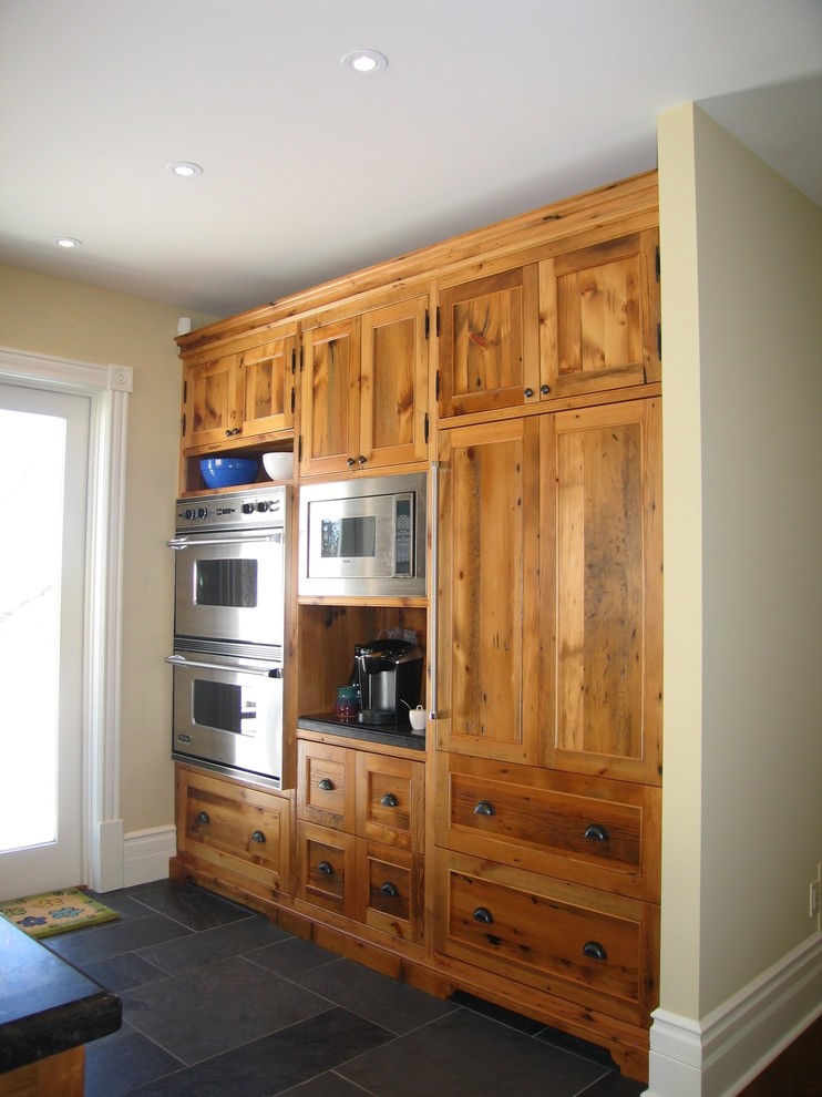 Kitchen - rustic kitchen idea in Toronto