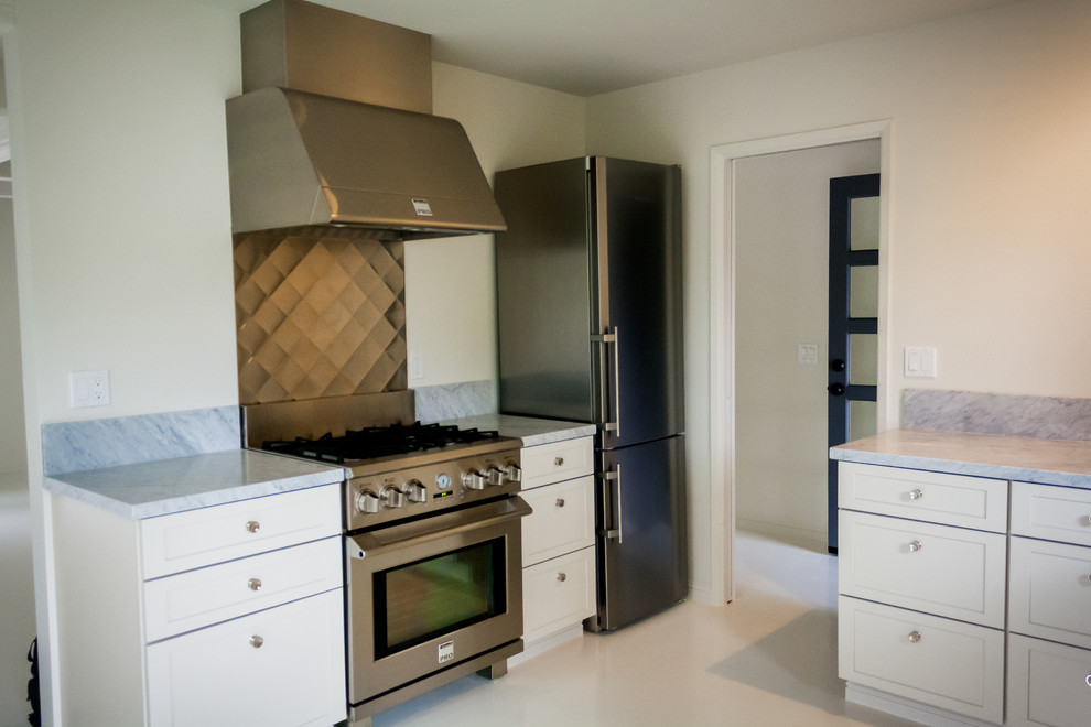 Kitchen - transitional kitchen idea in San Francisco with a farmhouse sink, white cabinets and marble countertops