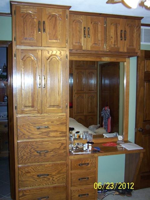 Bedroom storage and framed mirror