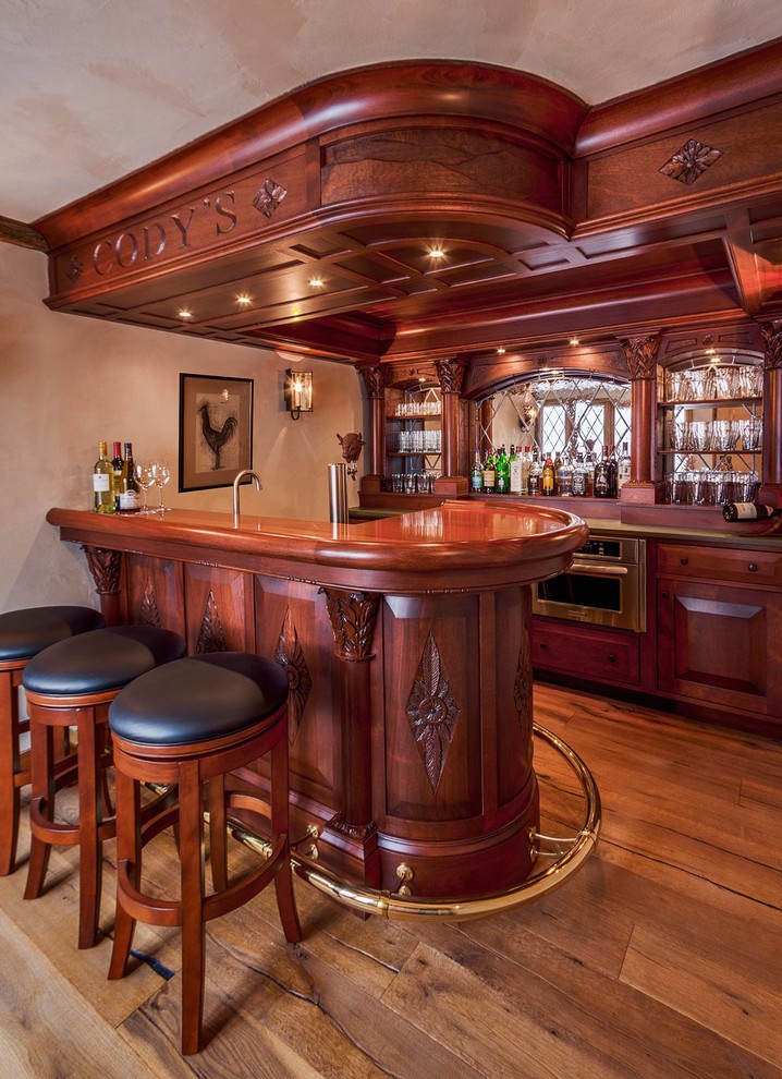 Design ideas for a traditional seated home bar in Burlington.