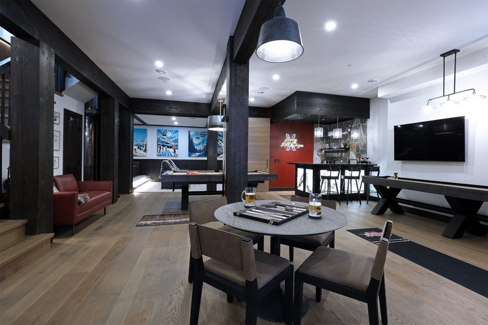 Example of a mountain style home design design in Vancouver