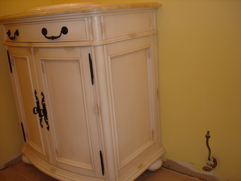 How do I make baseboards work with this vanity?