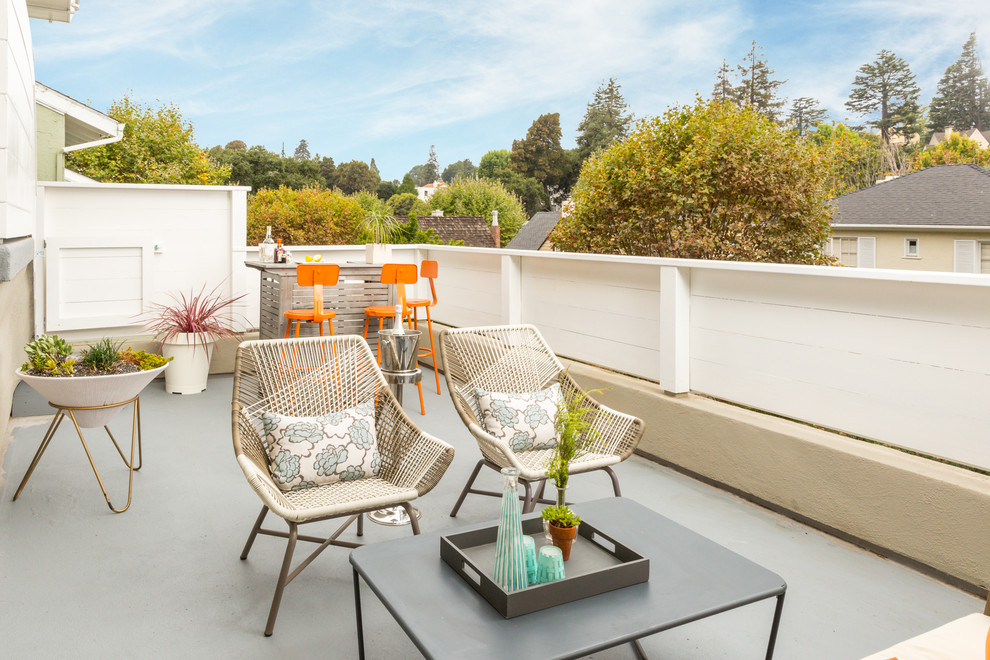 This is an example of a mid-sized midcentury rooftop deck in San Francisco with no cover.