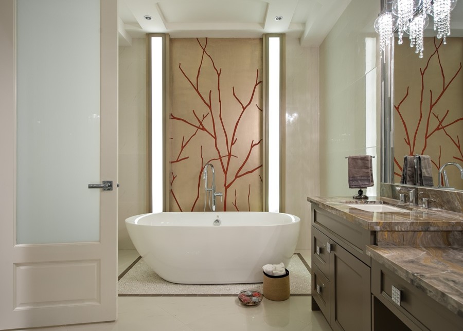 Photo of a large contemporary master bathroom in Vancouver with an undermount sink, raised-panel cabinets, grey cabinets, marble benchtops, a freestanding tub, a corner shower, a two-piece toilet, white tile, porcelain tile, grey walls and marble floors.