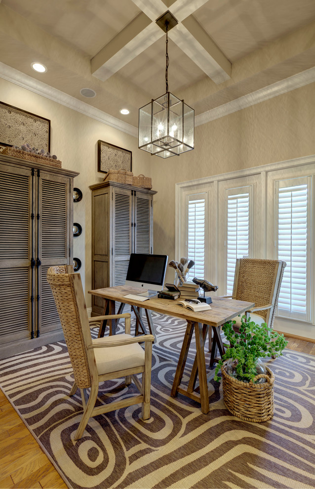 Transitional home office in Miami with beige walls.