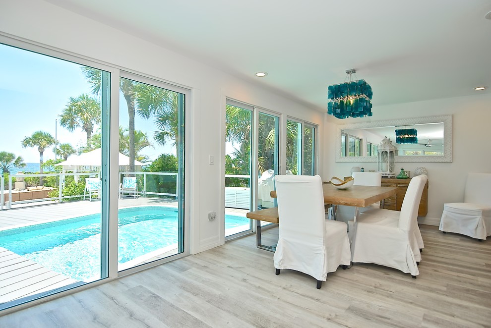 Inspiration for a beach style dining room in Tampa.