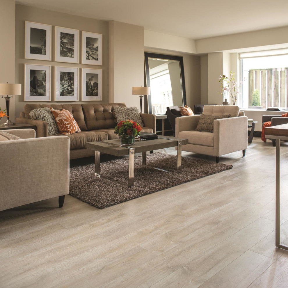 Photo of a modern living room with beige floor and laminate floors.