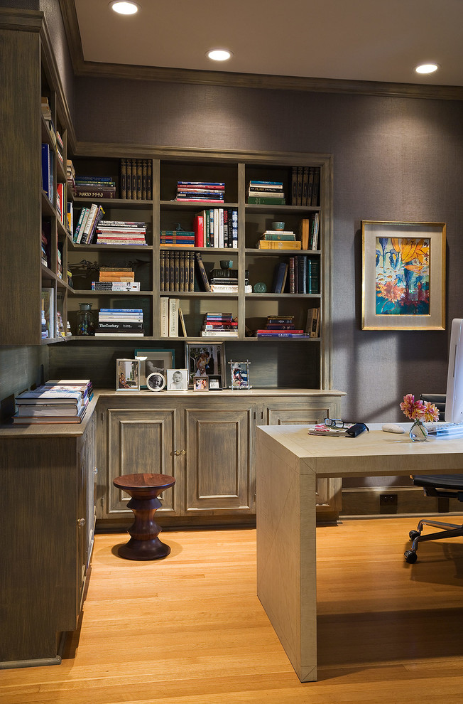 Inspiration for a traditional study room in Portland with grey walls, medium hardwood floors and a freestanding desk.
