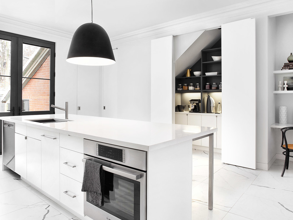 Photo of a large contemporary kitchen in Toronto with an undermount sink, flat-panel cabinets, white cabinets, quartz benchtops, white splashback, stone slab splashback, stainless steel appliances, porcelain floors and with island.