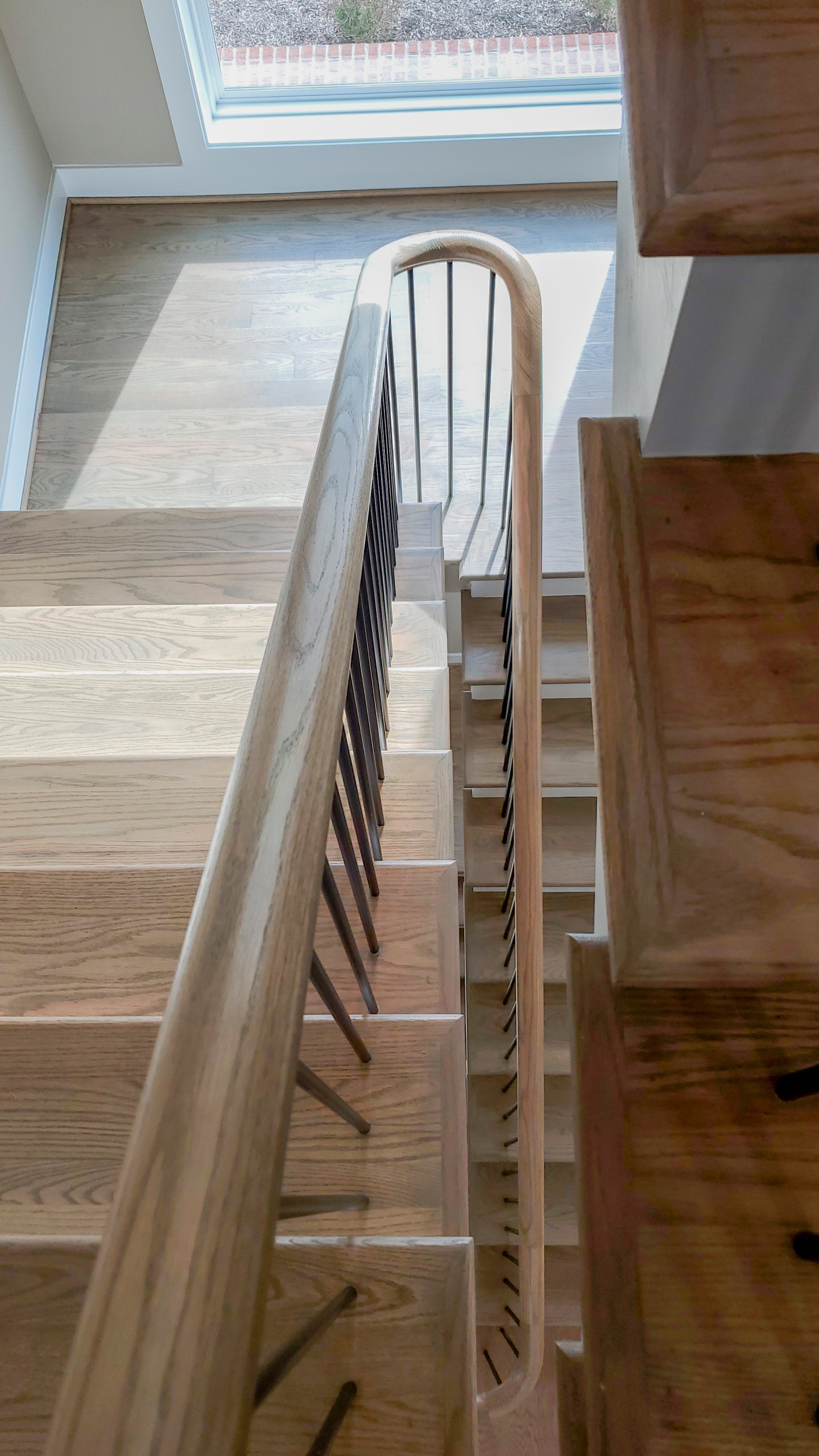 Project #153 | Sophisticated Red Oak Stair with Metal Balusters