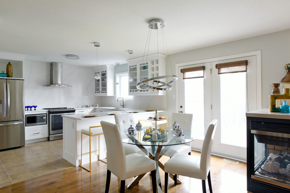 Example of a transitional kitchen design in Toronto