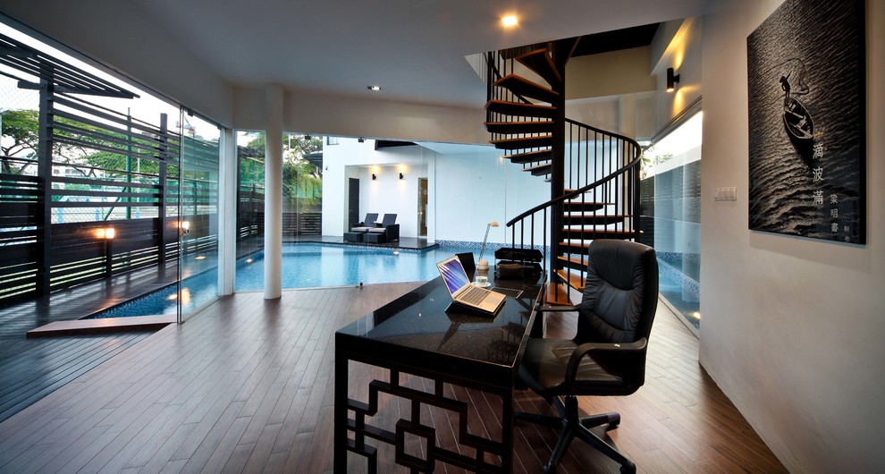 This is an example of an asian home office in Singapore with white walls.