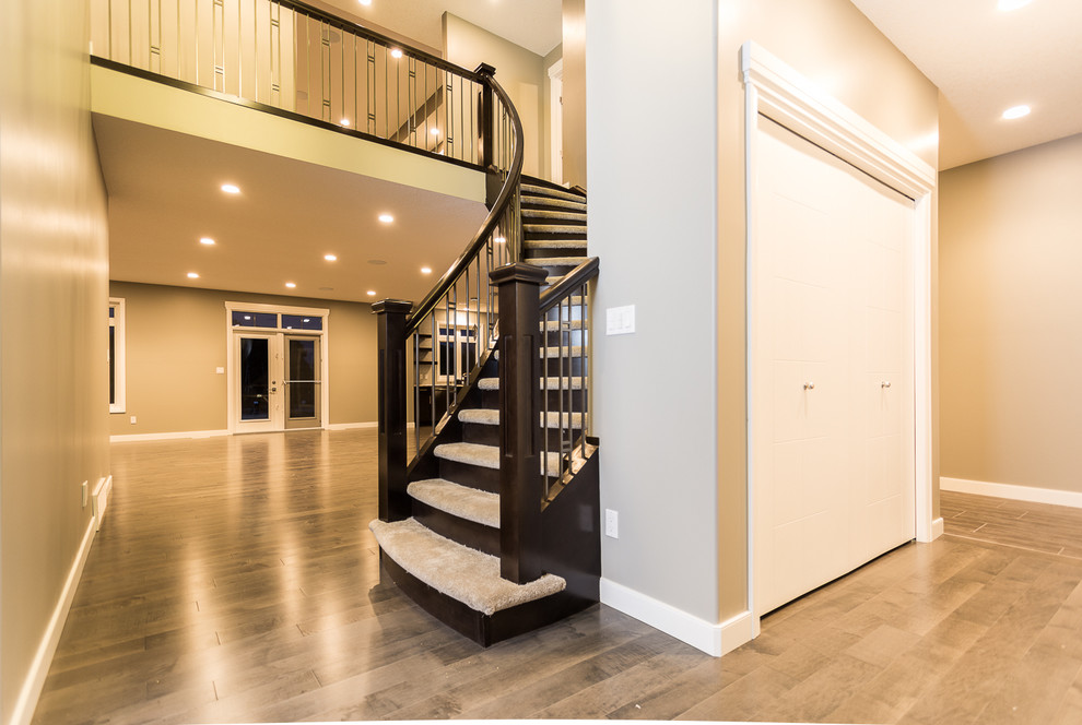 Transitional home design photo in Edmonton