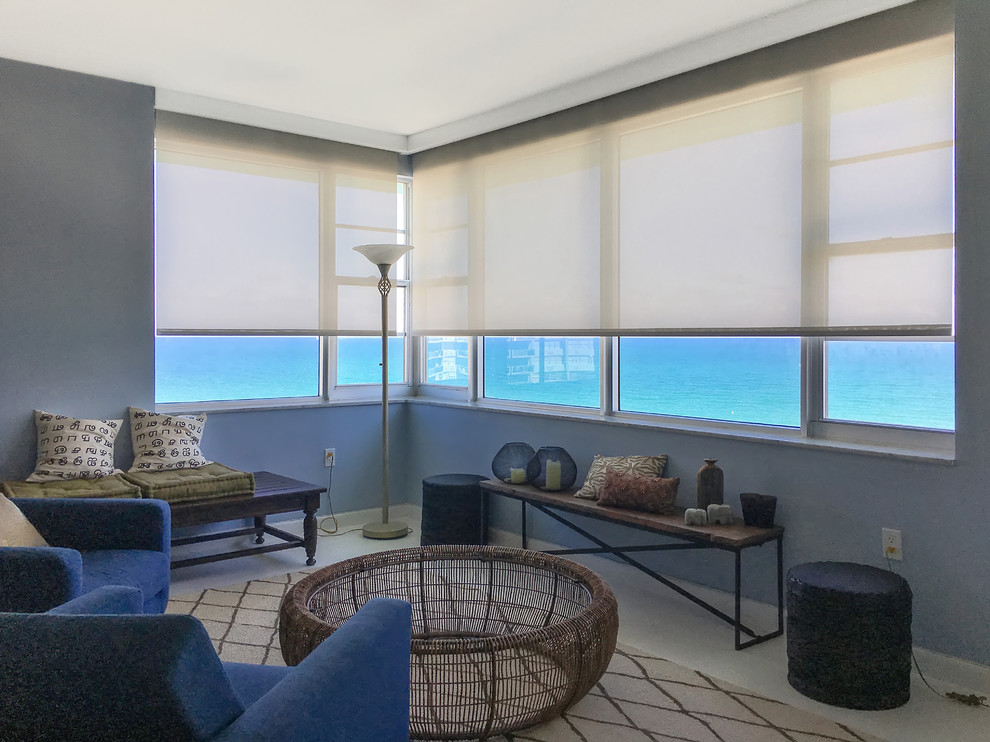 Design ideas for a mid-sized beach style formal open concept living room in Miami with grey walls, no fireplace, no tv and beige floor.