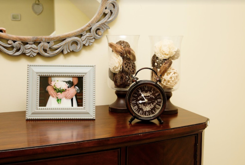 Example of a mid-sized transitional home design design in Calgary with beige walls