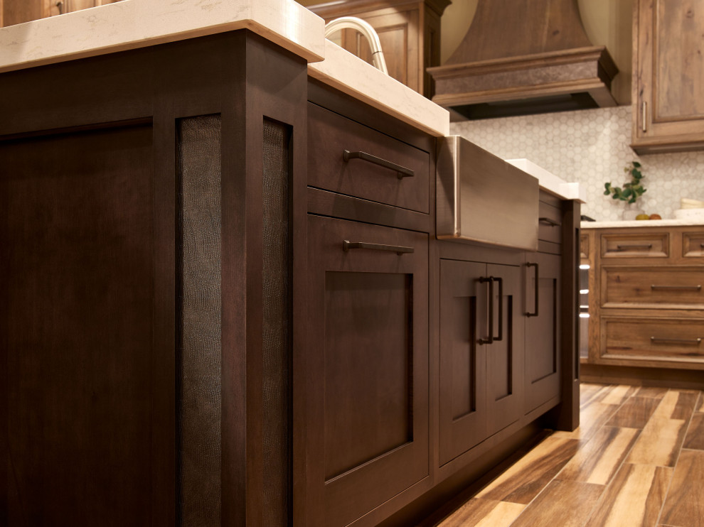 Inspiration for a large traditional u-shaped kitchen in Denver with a farmhouse sink, beaded inset cabinets, dark wood cabinets, quartz benchtops, with island, white benchtop and exposed beam.