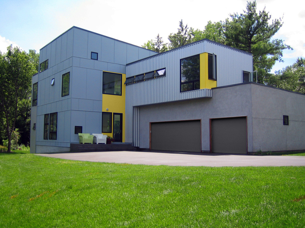 Modern two-storey exterior in Minneapolis with mixed siding.