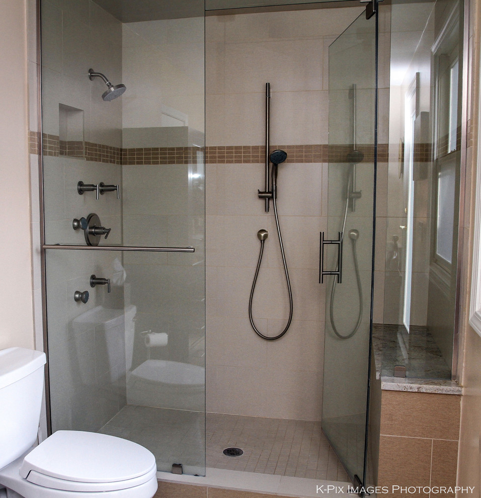 Doorless shower - large transitional master white tile and porcelain tile porcelain tile doorless shower idea in Chicago with an integrated sink, flat-panel cabinets, dark wood cabinets, granite countertops, a one-piece toilet and beige walls