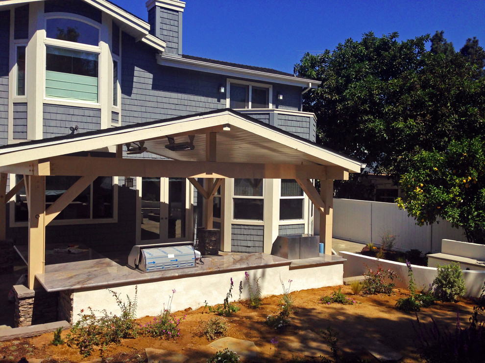 Example of a classic patio design in Orange County
