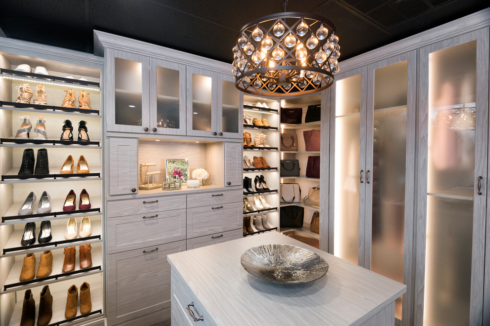 Large contemporary women's walk-in wardrobe in Other with shaker cabinets, white cabinets, porcelain floors and brown floor.