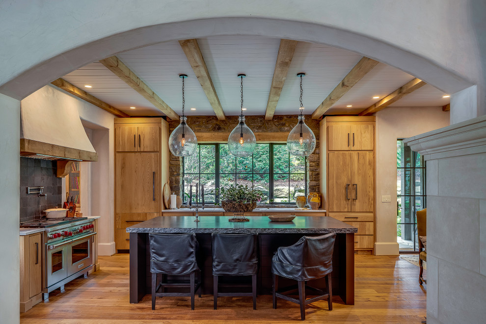 This is an example of a l-shaped kitchen with with island.