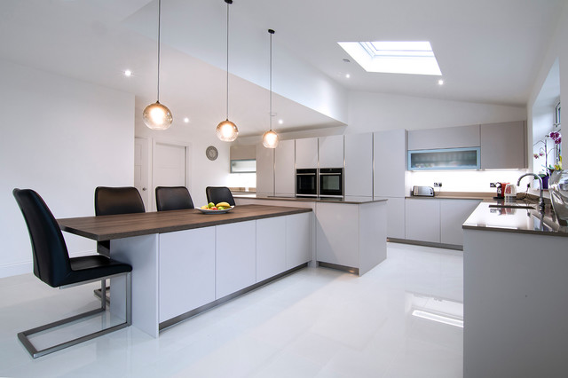 A symmetrical handle-less design in high gloss contemporary-kitchen