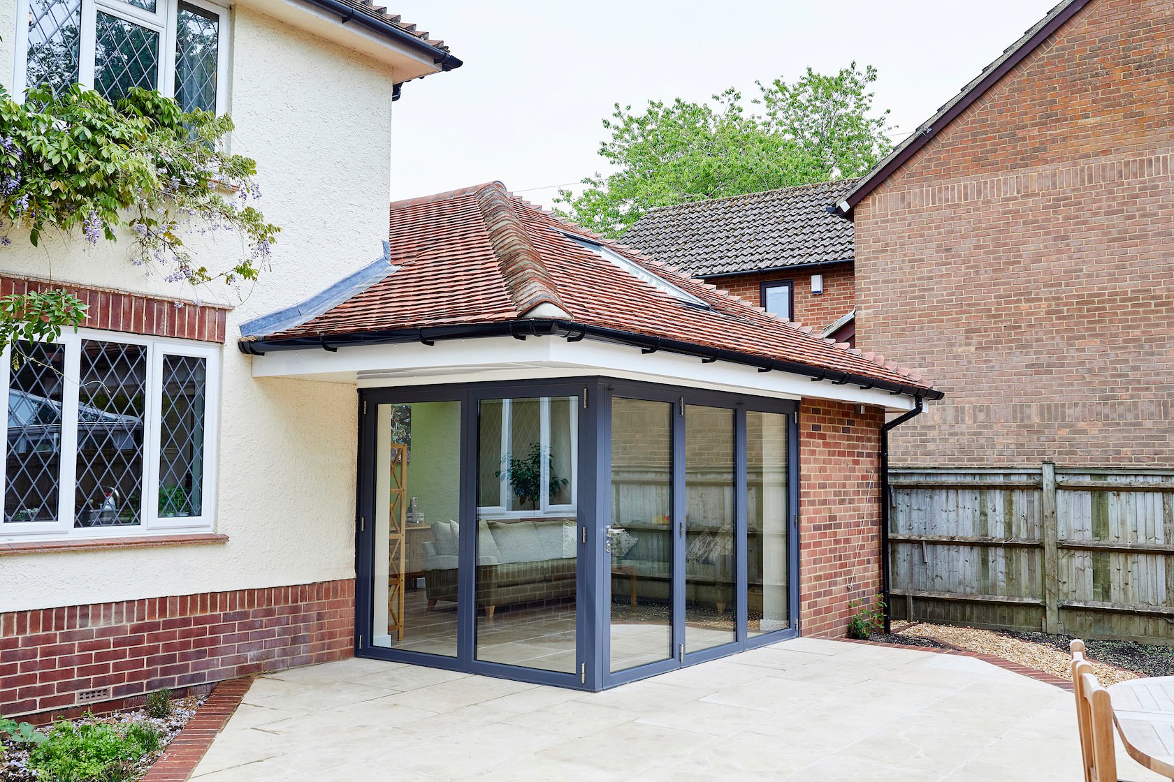 Single storey side extension with corner bi fold doors