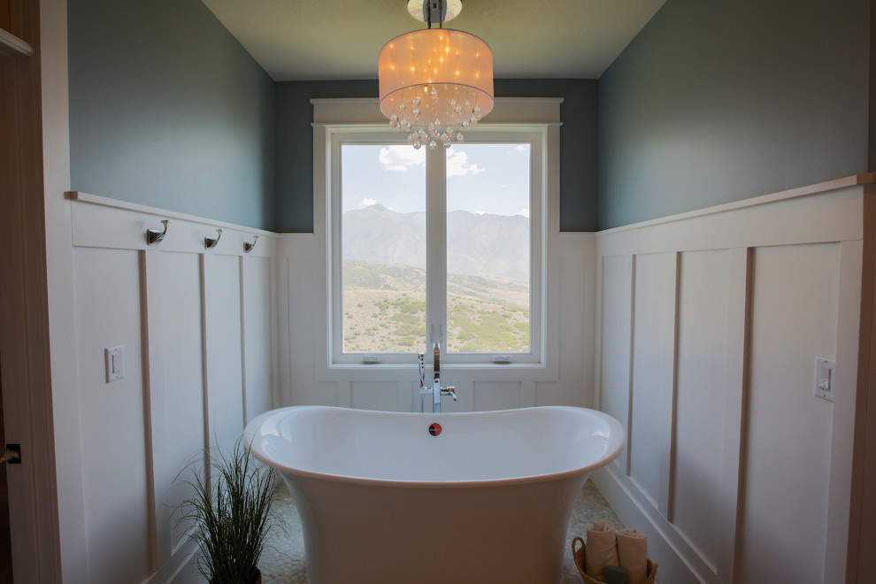Inspiration for a large transitional master bathroom in Salt Lake City with shaker cabinets, white cabinets and a freestanding tub.